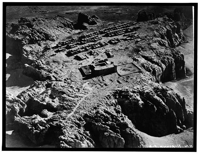 2.  Historic American Buildings Survey Photographer Unknown. PHOTOGRAPH OF AN AERIAL PHOTOGRAPH BOUGHT AT THE KIMO CURIO SHOP IN ALBUQUERQUE N.M. IN 1928. SHOWS ENTIRE VILLAGE AND THE CHURCH. - Pueblo of Acoma, Casa Blanca vicinity, Acoma Pueblo, Cibola County, NM